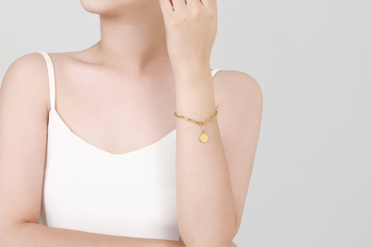Stainless steel armbandje met ronde bedel goldplated - Di Lusso