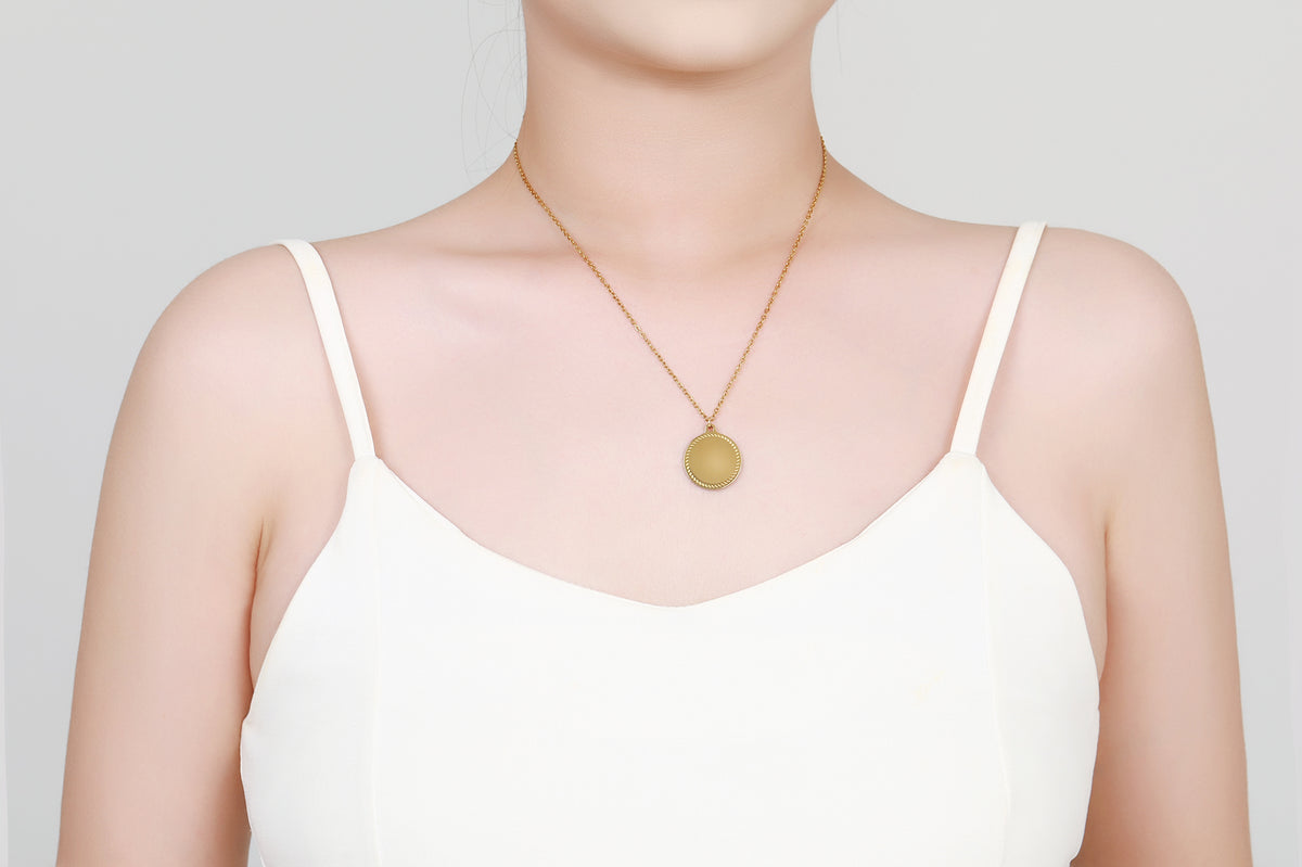 Stainless steel collier met ronde hanger goldplated - Di Lusso