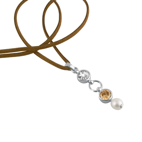 Collier en suédine avec pendentif long blanc